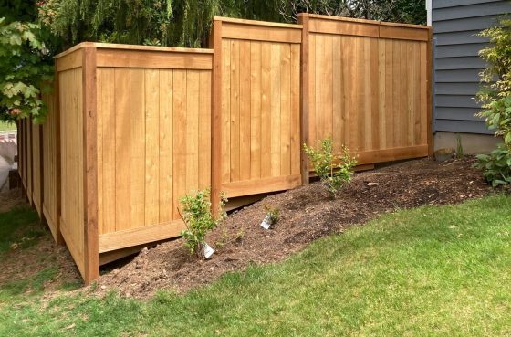 What Are the Best Fence Options for Sloped Yards?